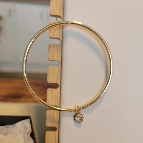 Coach Goldtone Bangle White/Gold C Charm NWOT includes box and coach wrapping - Picture 3 of 6